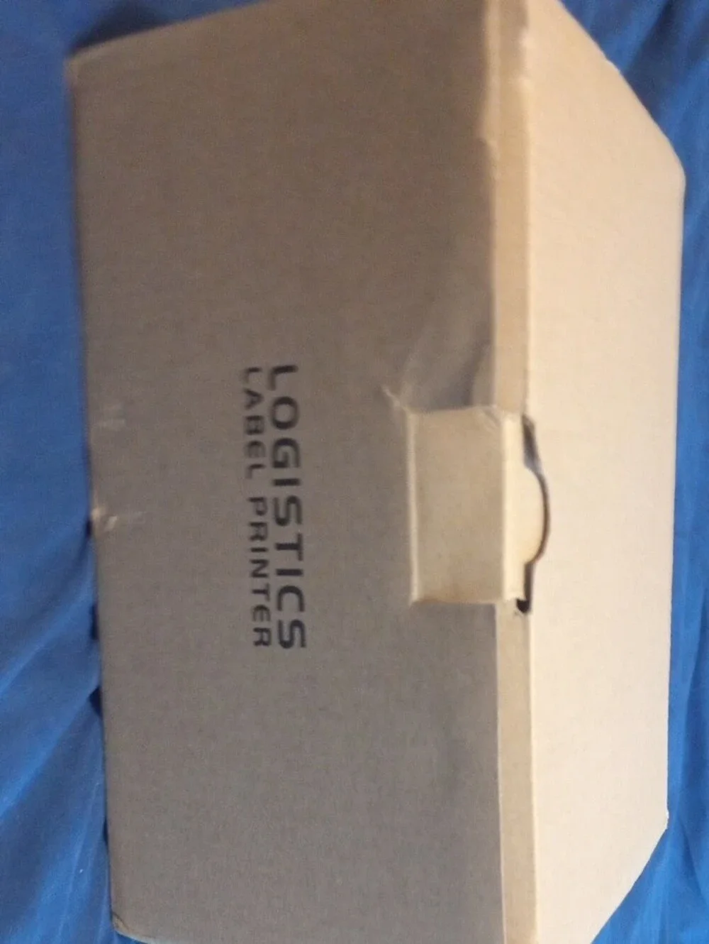 New White and Pale Pink Lable Printer.
